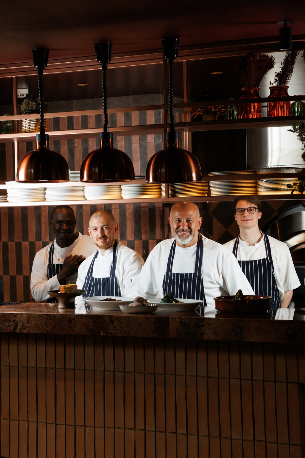 The Clio kitchen team at the pass