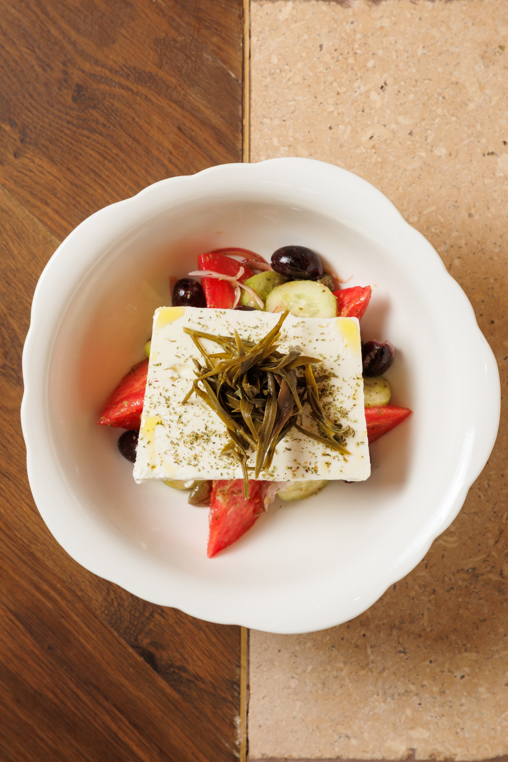 Greek salad with feta, tomato, olives and cucumber